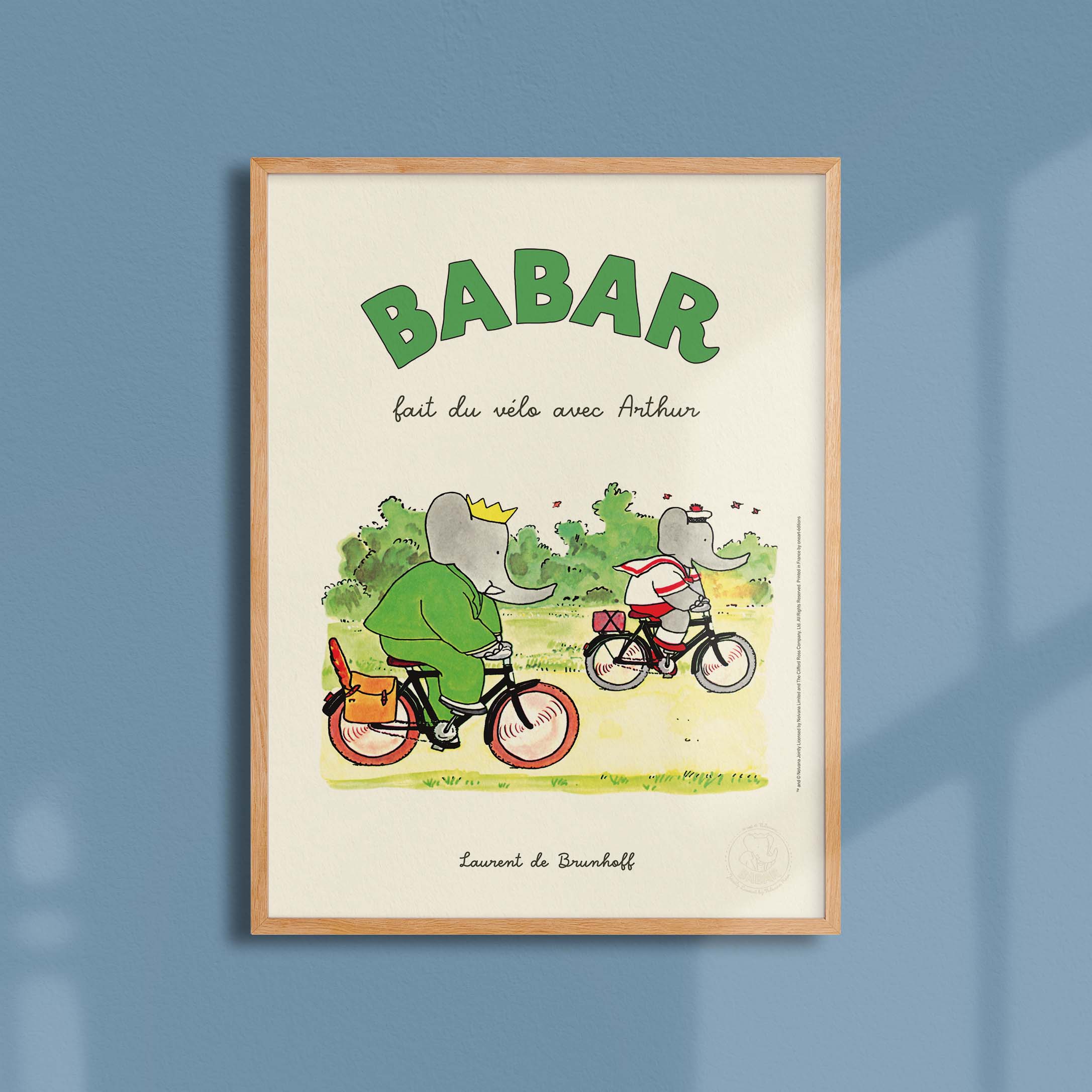 Poster Babar rides a bike with Arthur