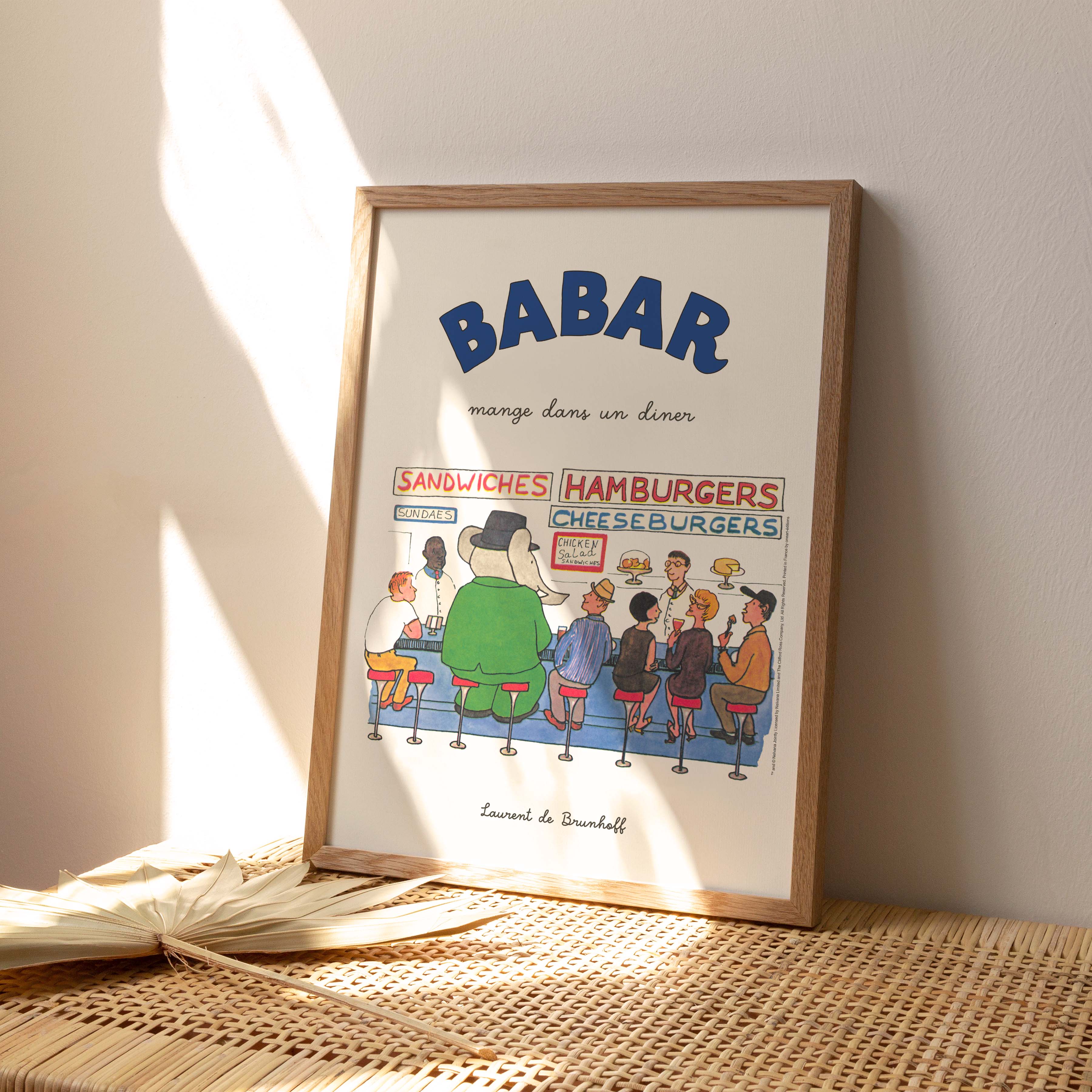 Poster Babar eats in a diner