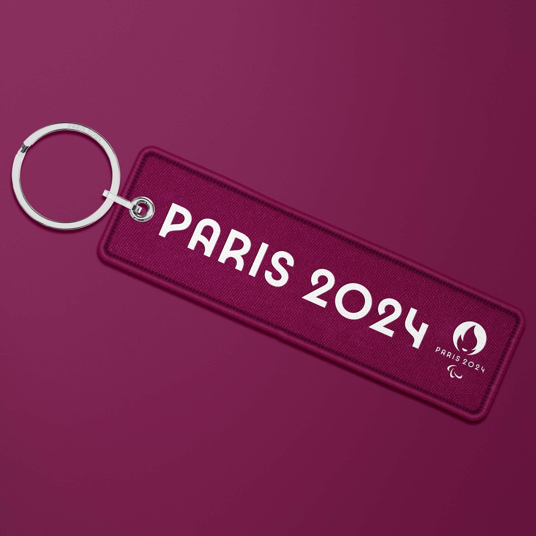 Paris 2024 Burgundy flame key ring - Para archery