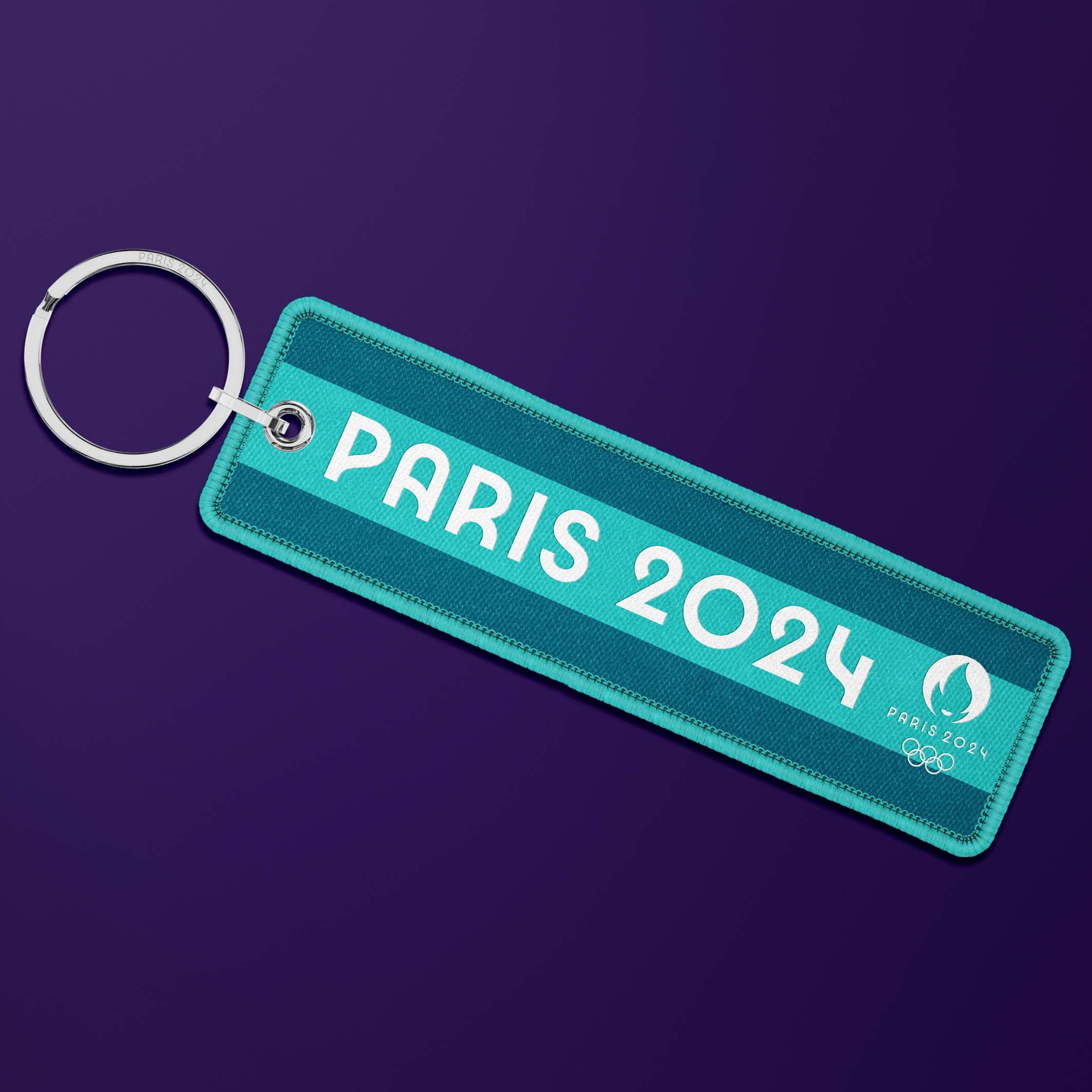 Paris 2024 Sports &amp; Stripes flame key ring - Tennis