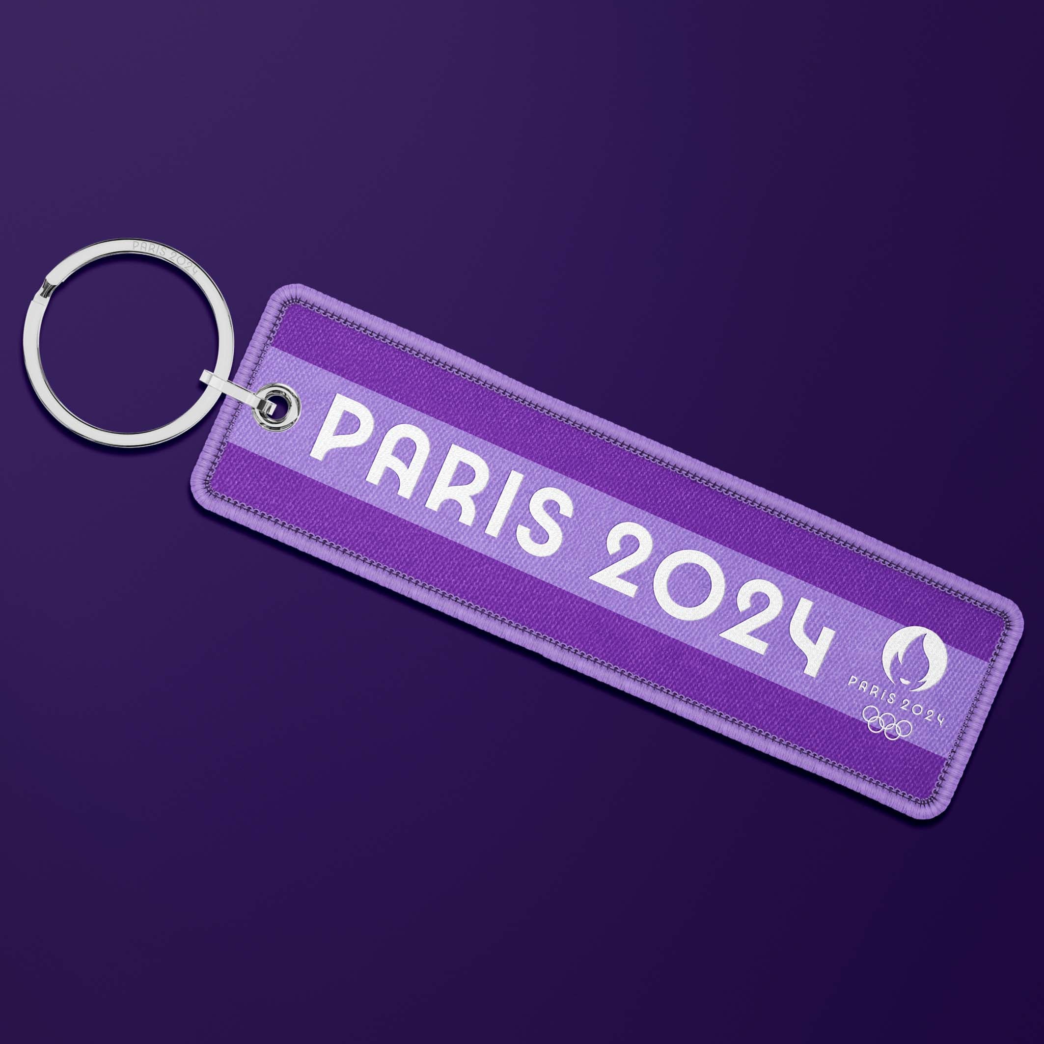 Paris 2024 Sports &amp; Stripes flame key ring - Athletics